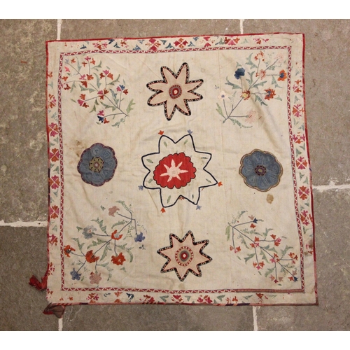 402 - A Suzani needlework panel, Uzbekistan 20th century, of square section embroidered with geometric flo... 