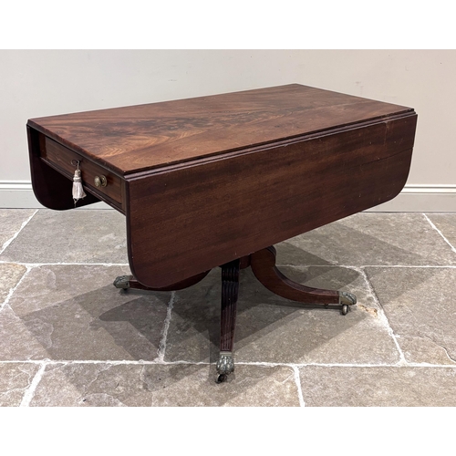 546 - A Regency mahogany Pembroke table, the rectangular top with two drop ends above a single drawer and ... 