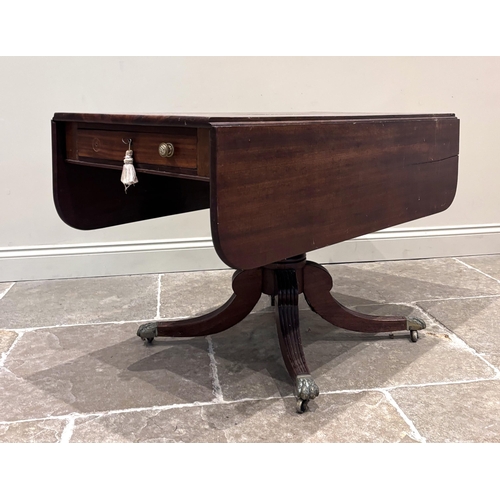 546 - A Regency mahogany Pembroke table, the rectangular top with two drop ends above a single drawer and ... 