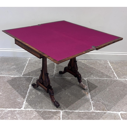 552 - A William IV rosewood 'Seddon Action' card table, the fold-over top lined with claret baize, upon a ... 