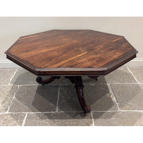 557 - A William IV rosewood breakfast table in the manner of W.A & S. Smee, the octagonal tilt-top with ga... 