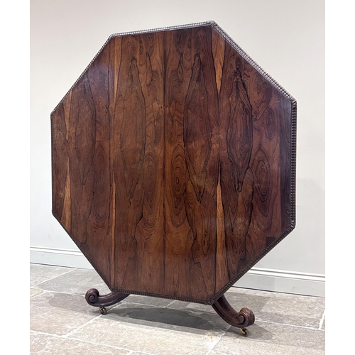 557 - A William IV rosewood breakfast table in the manner of W.A & S. Smee, the octagonal tilt-top with ga... 