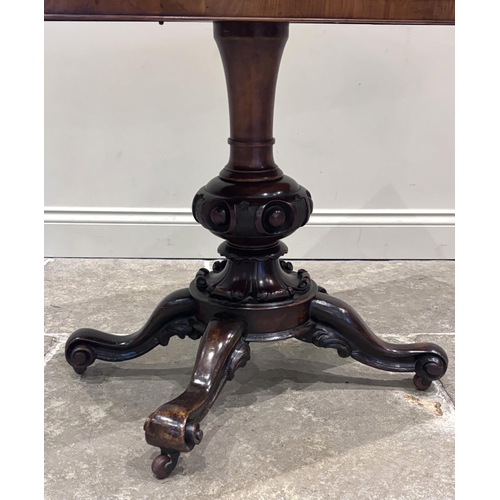 558 - A Victorian burr walnut card table, the rounded rectangular top opening to reveal a baize lined inte... 