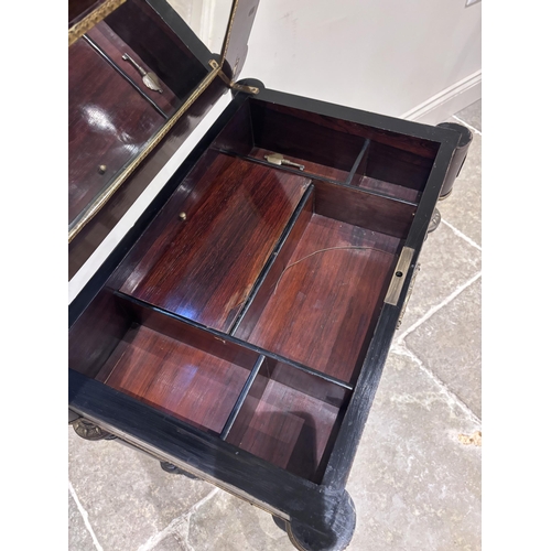 560 - A French ebonised and brass inlaid work table, 19th century, the hinged top inlaid with a central ar... 