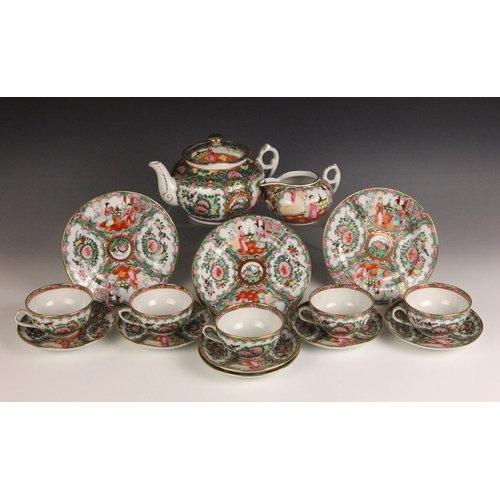 358 - A Chinese Canton Famille Rose tea service, comprising; five teacups and saucers, a teapot and cover,... 