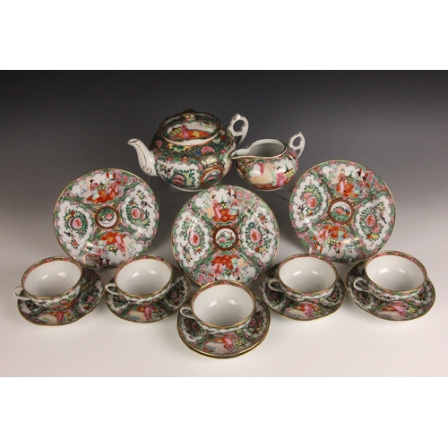 358 - A Chinese Canton Famille Rose tea service, comprising; five teacups and saucers, a teapot and cover,... 