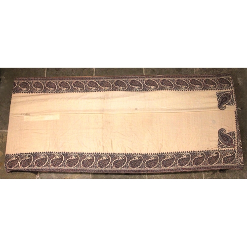 398 - A 19th century finely woven Kashmir style paisley shawl, in ivory with a paisley pattern border, fri... 