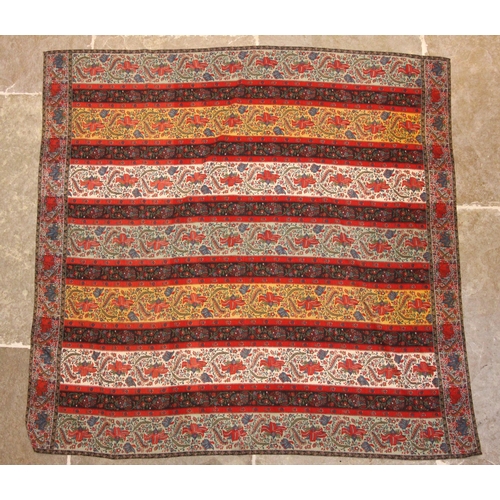 399 - A 19th century finely woven Kashmir style shawl, the ivory ground with delicate foliate borders and ... 