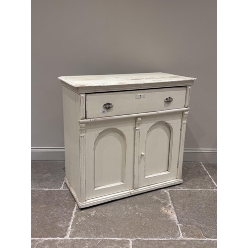 571 - A Victorian painted pine sideboard, the rectangular top above a single frieze drawer and a pair of c... 