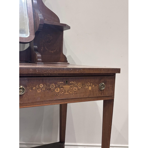 595 - An Edwardian satinwood inlaid dressing table, the swivel mirrored back below a broken swans neck ped... 