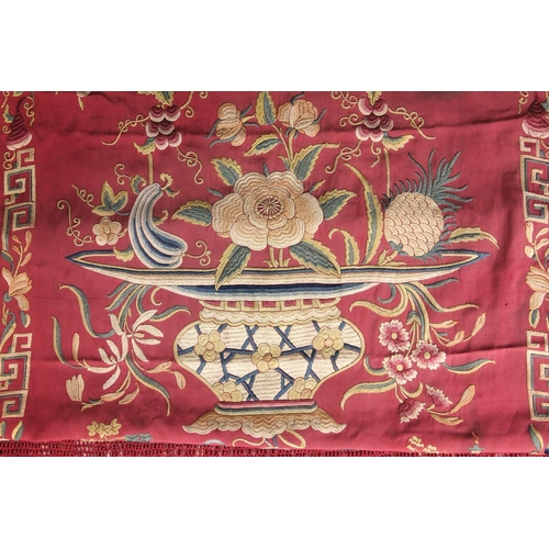 410 - A 19th century Chinese silk embroidered shawl, finely embroidered in polychrome threads with vases o... 