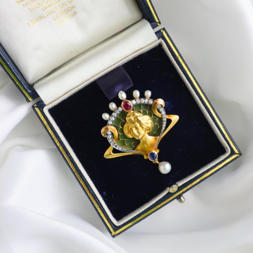 104 - An early 20th century French brooch/pendant, the Art Nouveau brooch with central depiction of maiden... 
