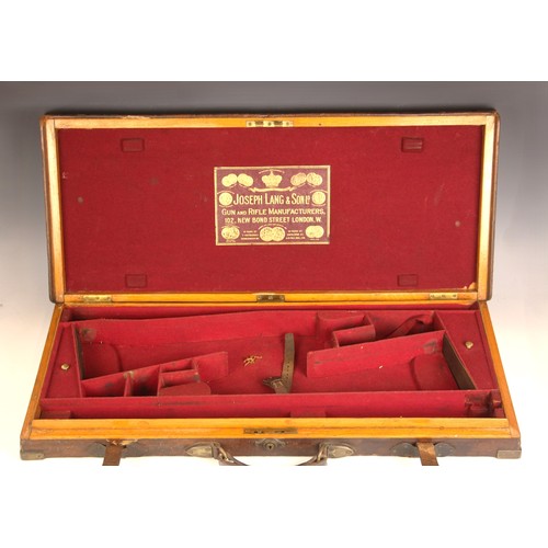 395 - A shotgun case by Joseph Lang and Son, early 20th century, the wooden framed leather and brass bound... 
