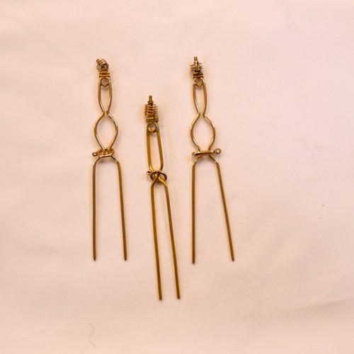 150 - A 19th century trio of diamond brooches converting to a tiara, hair combs and /or pendants, the thre... 