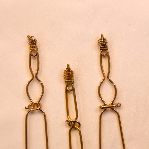 150 - A 19th century trio of diamond brooches converting to a tiara, hair combs and /or pendants, the thre... 