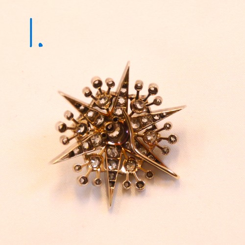 150 - A 19th century trio of diamond brooches converting to a tiara, hair combs and /or pendants, the thre... 