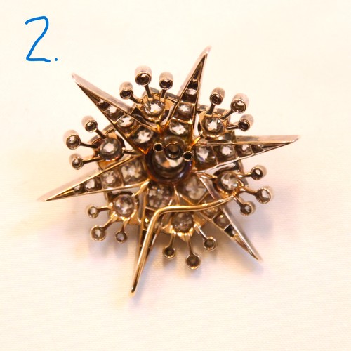 150 - A 19th century trio of diamond brooches converting to a tiara, hair combs and /or pendants, the thre... 