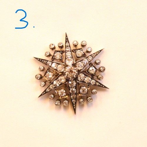 150 - A 19th century trio of diamond brooches converting to a tiara, hair combs and /or pendants, the thre... 