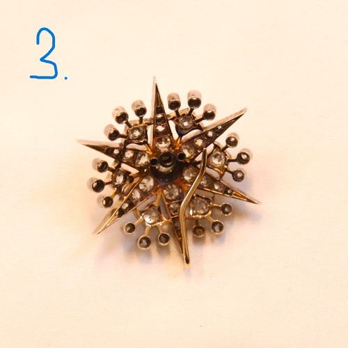 150 - A 19th century trio of diamond brooches converting to a tiara, hair combs and /or pendants, the thre... 