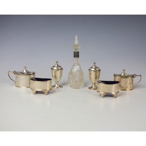 38 - A George V silver double condiment set, Haseler and Bill, Chester 1921, comprising two mustard pots,... 