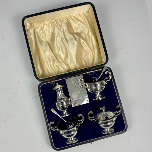 58 - A selection of silver, including a pair of William IV silver mustard pot spoons, London 1831, 10cm, ... 
