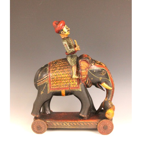 320 - A collection of Indian and South East Asian carvings, 20th century, to include an elephant, a horse,... 