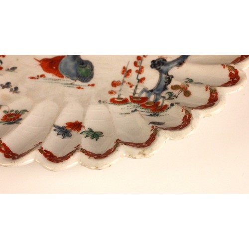 303 - A Bow porcelain kakiemon palette chrysanthemum shaped dish in the 'Two Quail' pattern, mid 18th cent... 