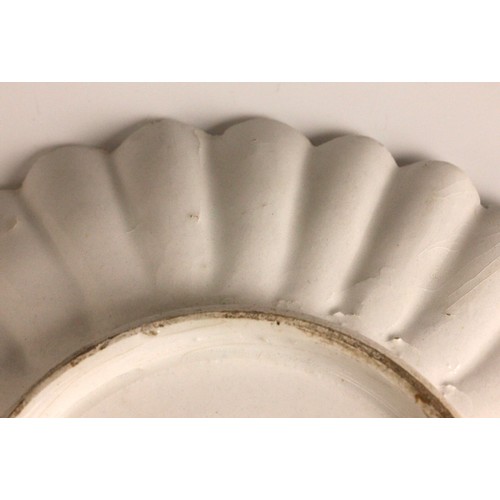 303 - A Bow porcelain kakiemon palette chrysanthemum shaped dish in the 'Two Quail' pattern, mid 18th cent... 