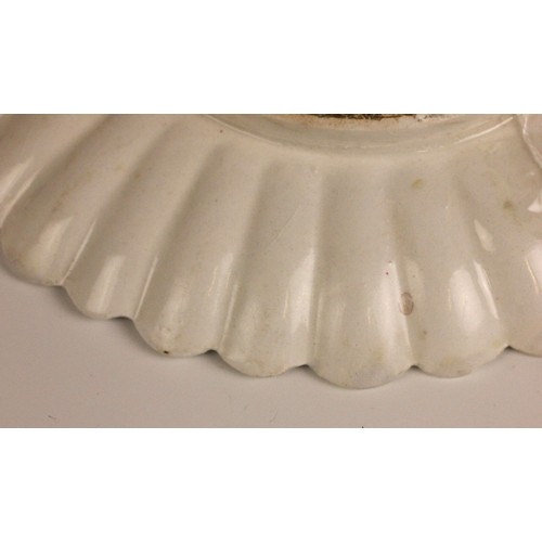 303 - A Bow porcelain kakiemon palette chrysanthemum shaped dish in the 'Two Quail' pattern, mid 18th cent... 