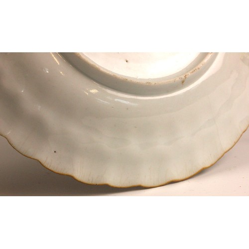 340 - An 18th century Japanese Gold Imari 'Quail' plate, 18th century, of fluted circular form, painted to... 