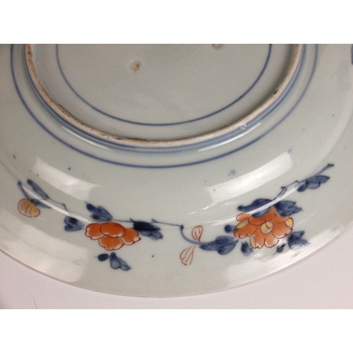 343 - A set of four Japanese Imari porcelain plates, Arita, 18th century, each of circular form and decora... 