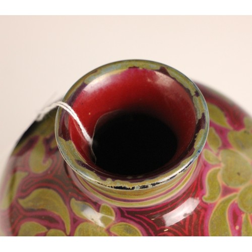 310 - Bernard Moore (British, 1850-1935), a flambe glazed art pottery vase, of inverted baluster form with... 