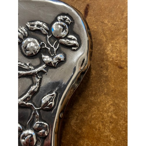 35 - An Edwardian silver mounted photograph frame, Charles S Green & Co Ltd, Birmingham 1904, the Arts an... 