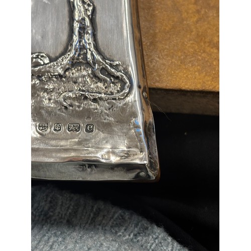 35 - An Edwardian silver mounted photograph frame, Charles S Green & Co Ltd, Birmingham 1904, the Arts an... 