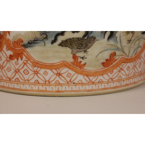 328 - A Chinese porcelain iron-red brush pot (bitong), Qianlong seal mark, of cylindrical form and externa... 