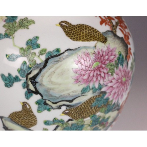 331 - A Chinese porcelain famille rose vase, Daoguang character mark, the begonia shaped vase with two ruy... 