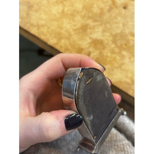 50 - An Edwardian silver mounted desk time piece, Wagner & Gerstley Ltd, Birmingham 1905, of arched form ... 