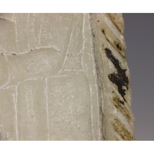 363 - A Western Asiatic carved soapstone stele, Mesopotamia, carved with two Assyrian gods, the reverse ca... 