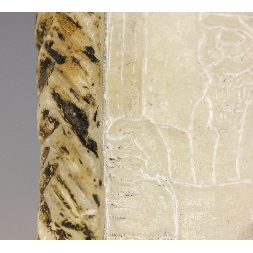 363 - A Western Asiatic carved soapstone stele, Mesopotamia, carved with two Assyrian gods, the reverse ca... 