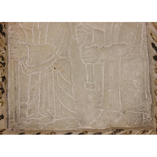 363 - A Western Asiatic carved soapstone stele, Mesopotamia, carved with two Assyrian gods, the reverse ca... 