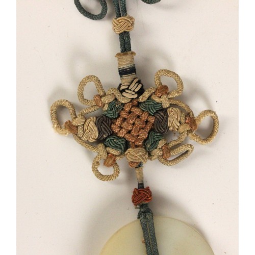 323 - A Chinese silk scroll pendant or tassel, late 19th century, woven to depict a bat and butterfly susp... 