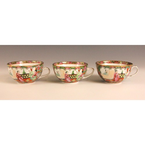 358 - A Chinese Canton Famille Rose tea service, comprising; five teacups and saucers, a teapot and cover,... 