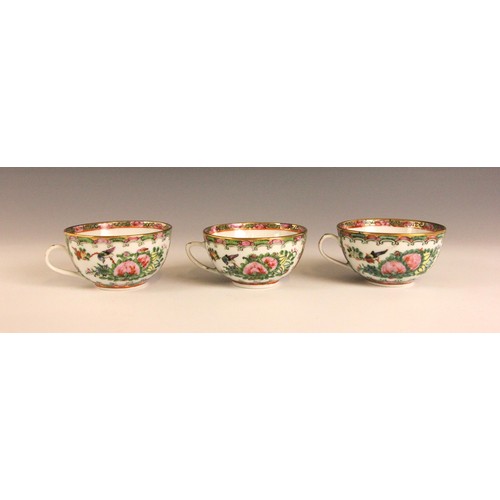 358 - A Chinese Canton Famille Rose tea service, comprising; five teacups and saucers, a teapot and cover,... 