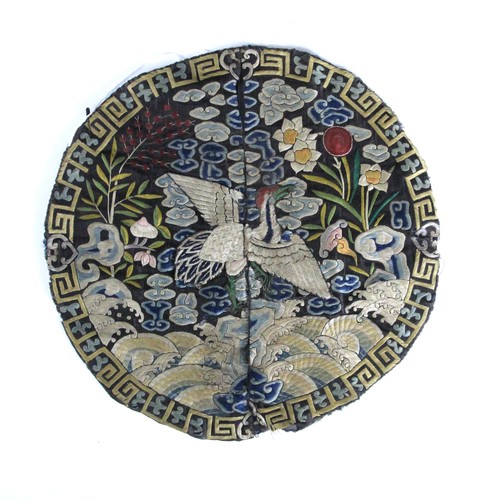 411 - A 19th century Chinese silk embroidered civil rank badge, embroidered to the centre with an egret, e... 