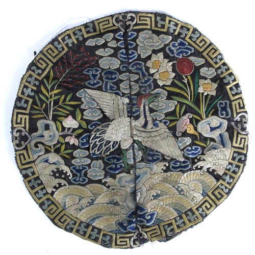411 - A 19th century Chinese silk embroidered civil rank badge, embroidered to the centre with an egret, e... 