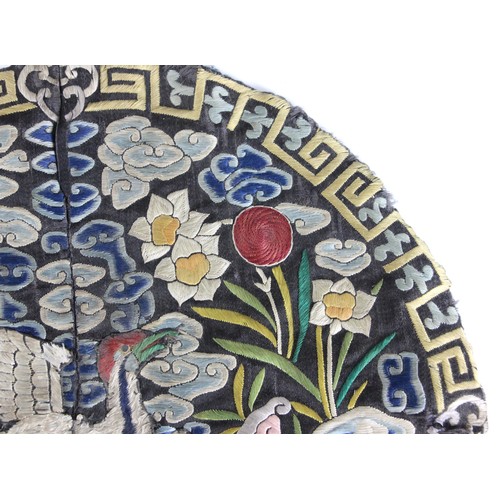 411 - A 19th century Chinese silk embroidered civil rank badge, embroidered to the centre with an egret, e... 