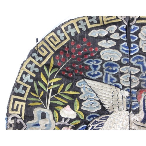 411 - A 19th century Chinese silk embroidered civil rank badge, embroidered to the centre with an egret, e... 