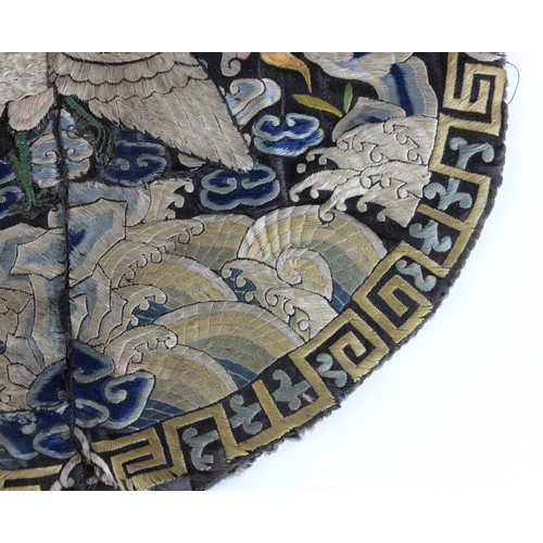 411 - A 19th century Chinese silk embroidered civil rank badge, embroidered to the centre with an egret, e... 