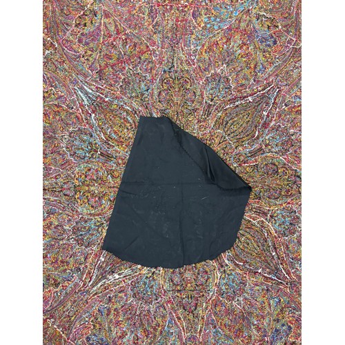 398 - A 19th century finely woven Kashmir style paisley shawl, in ivory with a paisley pattern border, fri... 