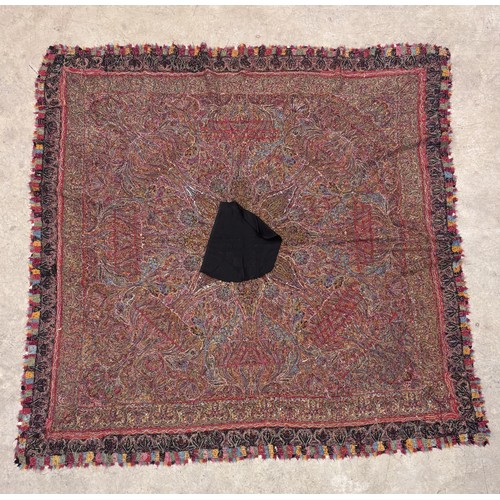 398 - A 19th century finely woven Kashmir style paisley shawl, in ivory with a paisley pattern border, fri... 